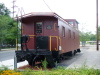 A train car restored and located near the depot