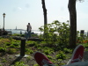 Resting at Battery Park, with the Statue of Liberty in the distance