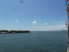 Southern Governors Island, with the Statue of Liberty off to the right, and Staten Island and the cranes of Newark Bay in the distance