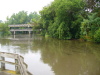 Huron River. In the distance, the Cross Street Bridge, and the Tridge