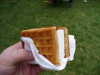 A close up of a hot ice cream waffle