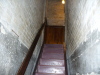 Secret stairs up from wine cellar to the study